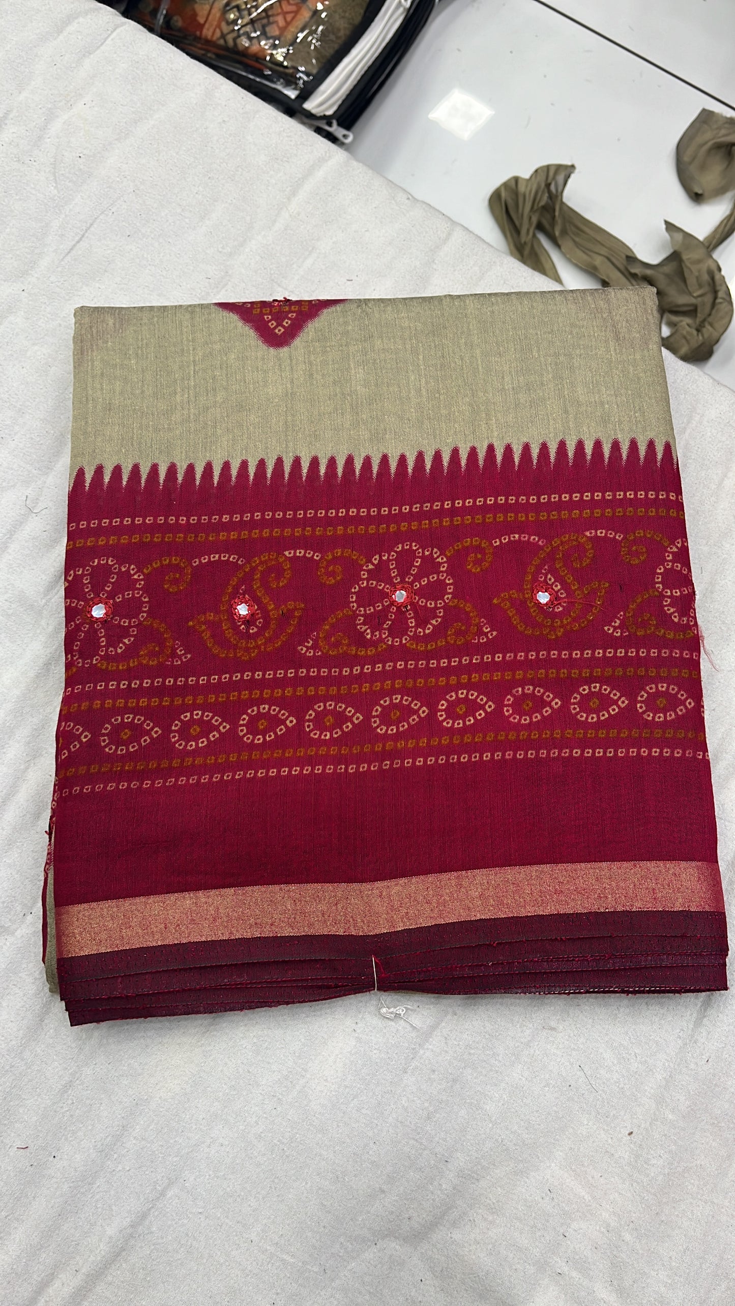 Elegant Maroon & Beige Mal Cotton Saree with Traditional Bandhej Motifs and Subtle Mirror Work
