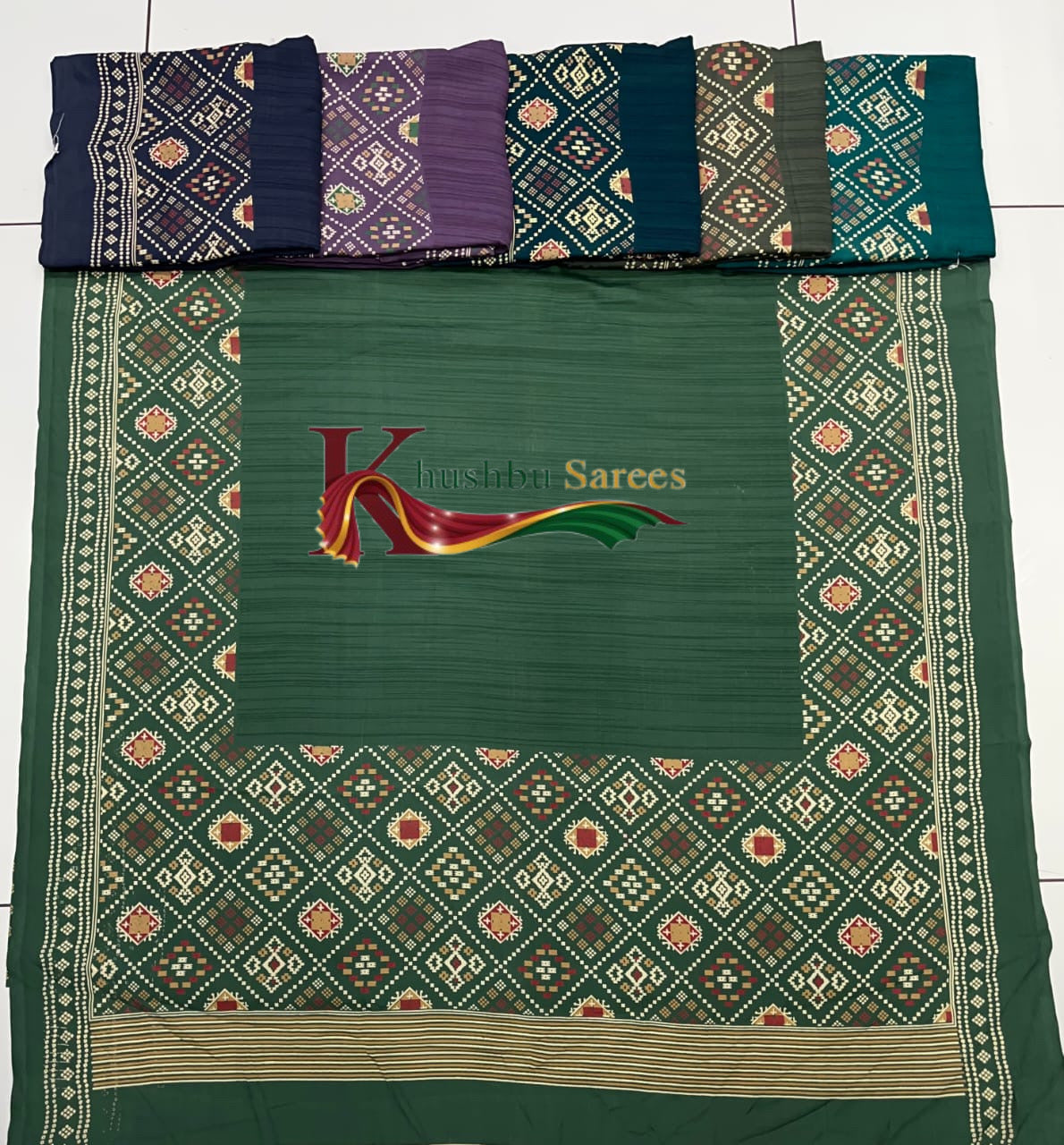 “Stylish Green Silk Crepe Saree with Designer Prints”
