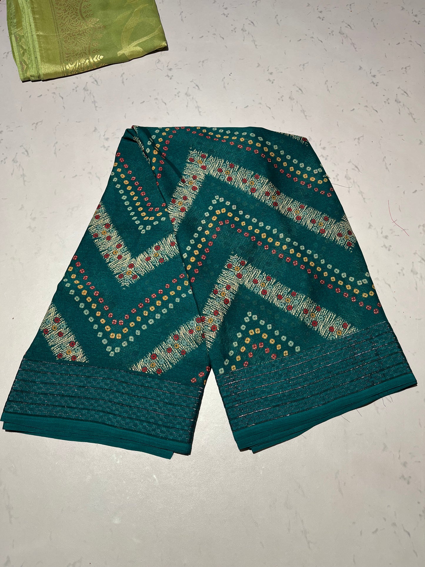 “Teal Green Viscose Saree with Colorful Geometric Chevron Design”
