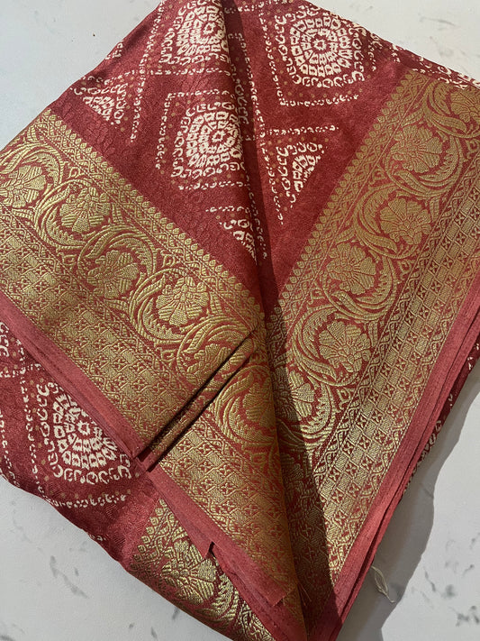 “Elegant Red Banarasi Silk Saree with Golden Zari Weaving and Traditional Motifs”