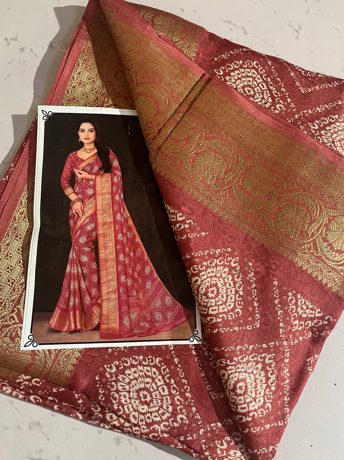 “Elegant Red Banarasi Silk Saree with Golden Zari Weaving and Traditional Motifs”